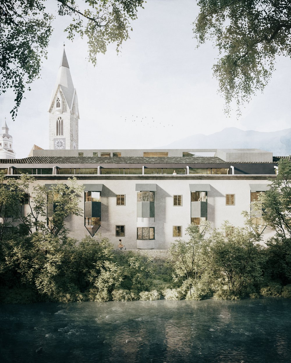 Edificio antico con campanile a punta e fiume in primo piano
